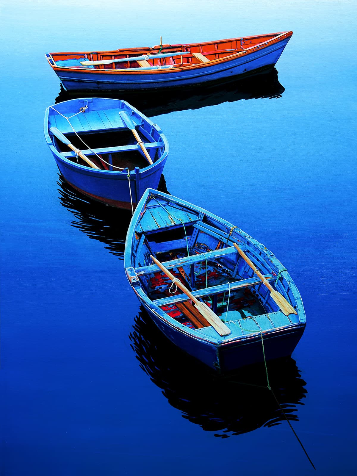 3 painted working skiffs